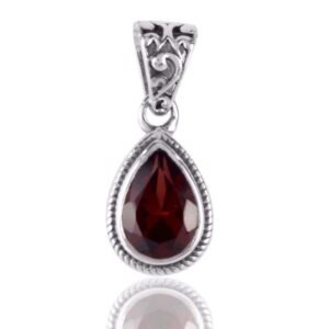 Sterling silver garnet teardrop pendant with vintage design and faceted red gemstone. main view