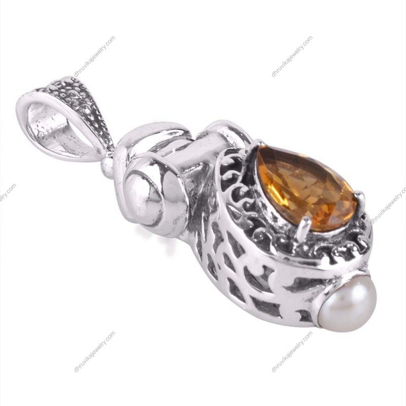 Sterling silver citrine pendant with teardrop gemstone and intricate silver detailing alternate image