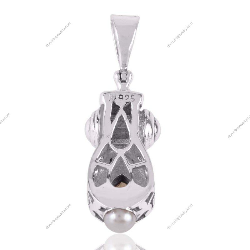 Sterling silver citrine pendant with teardrop gemstone and intricate silver detailing view1