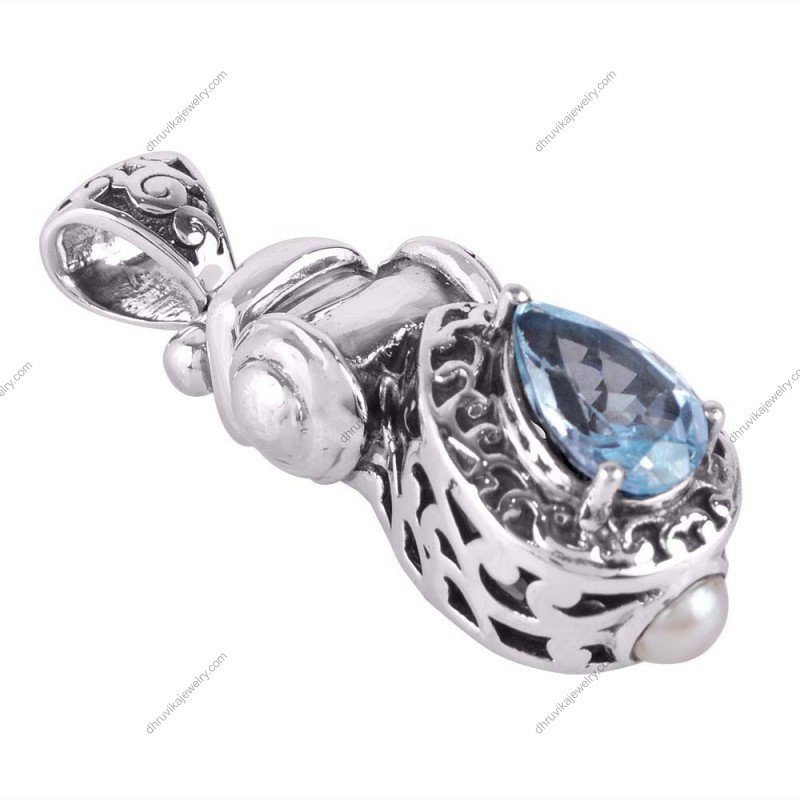 Sterling silver blue topaz filigree pendant with intricate vintage design alternate image