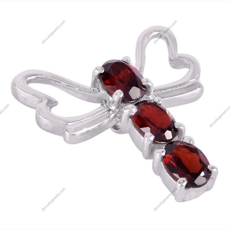 Sterling silver garnet dragonfly pendant with three oval-cut red garnet stones in an elegant silver setting. alternate image
