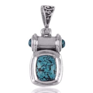 Sterling silver turquoise pendant with intricate detailing and artisan design main view