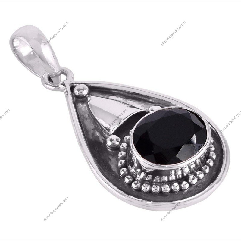 Elegant black onyx teardrop pendant in sterling silver with intricate detailing alternate image