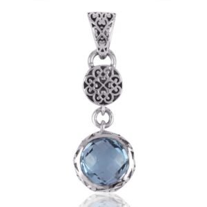 Sterling silver blue topaz pendant with vintage filigree design, elegant gemstone jewelry. main view