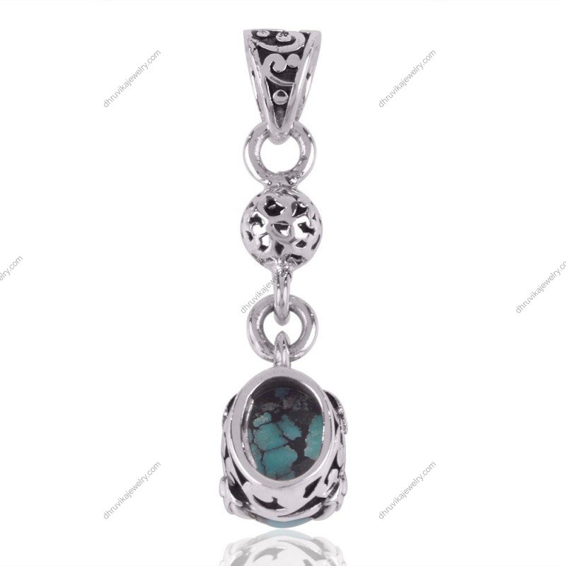 Sterling silver turquoise pendant with intricate vintage-inspired design view1