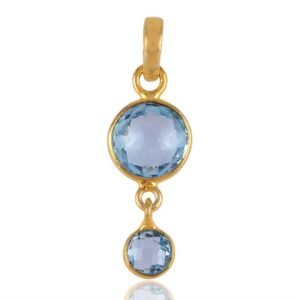 Gold-plated blue topaz pendant with bezel-set gemstones, elegant and timeless jewelry piece. main view