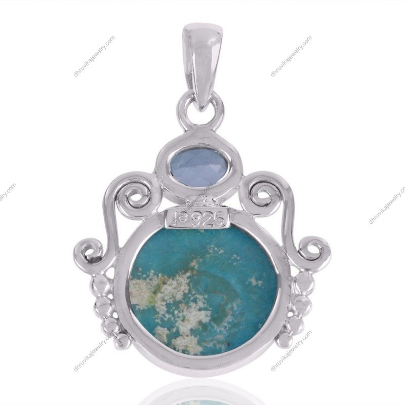Sterling silver turquoise and blue topaz pendant with intricate scrollwork design view1
