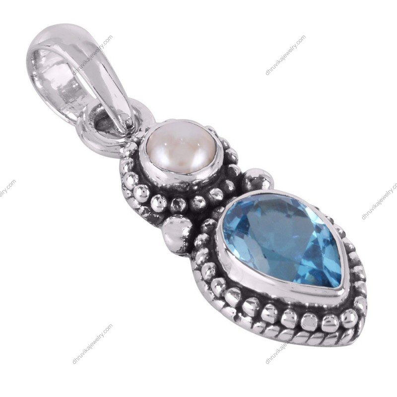 Sterling silver blue topaz and pearl pendant with vintage detailing, perfect for elegant styling and gift giving. alternate image