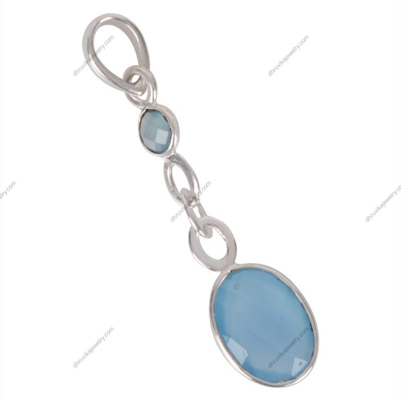 Sterling silver blue topaz pendant with dangle design, featuring two gemstones. alternate image