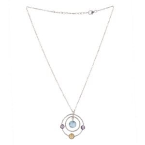 Sterling silver orbit pendant necklace with gemstones, featuring blue topaz, amethyst, and citrine. main view