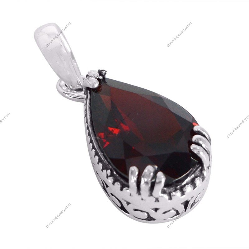 Sterling silver garnet teardrop pendant with faceted red gemstone in elegant setting alternate image