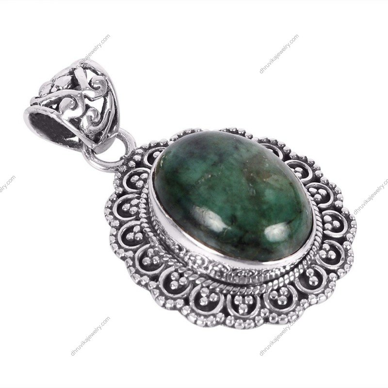 Handcrafted vintage-style turquoise pendant in sterling silver with intricate detailing alternate image