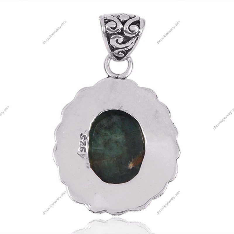 Handcrafted vintage-style turquoise pendant in sterling silver with intricate detailing view1