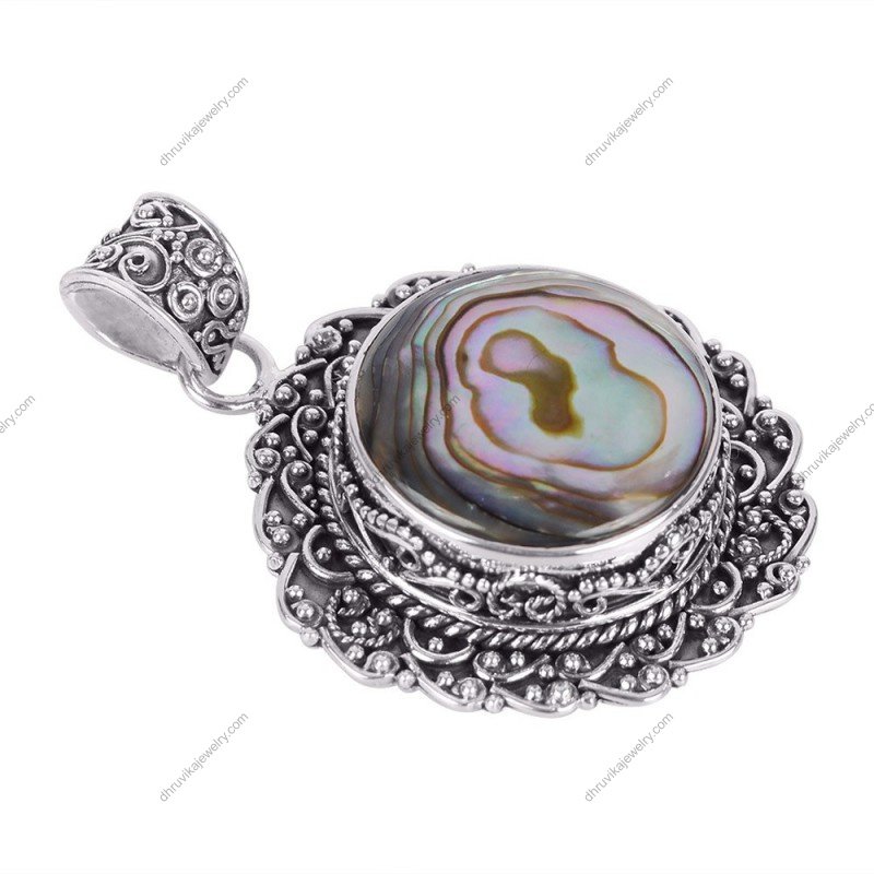 Vintage silver abalone shell pendant with intricate filigree design, handcrafted in sterling silver. alternate image