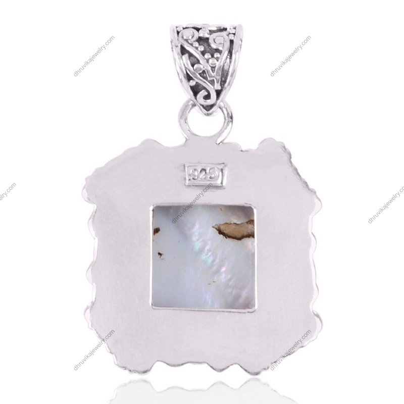 Sterling silver abalone shell pendant with vintage ornate frame, crafted for boho and statement jewelry lovers. view1