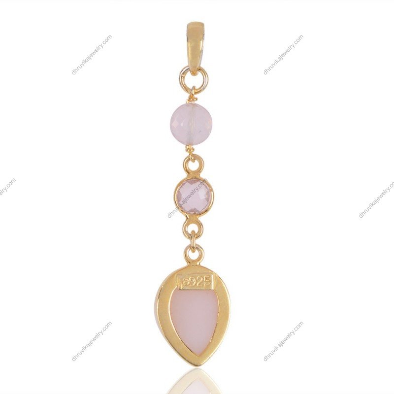 Elegant silver rose quartz pendant with faceted gemstones in a delicate sterling silver setting view1