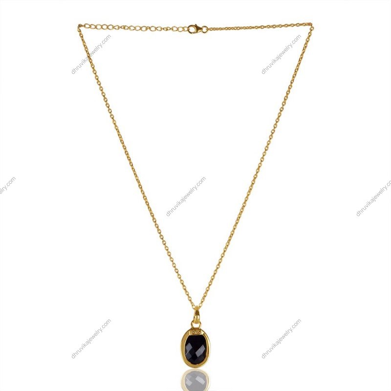 Gold-plated black onyx pendant necklace with faceted oval gemstone on delicate chain view1