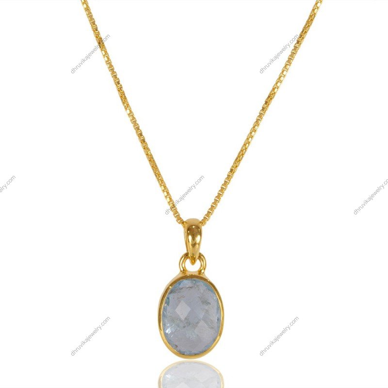 Gold aquamarine pendant necklace with faceted gemstone in an elegant setting alternate image