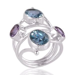 Silver statement ring with blue topaz and amethyst gemstones, handcrafted artistic design main view