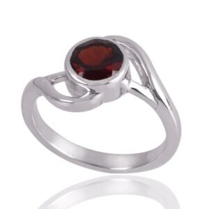 Elegant garnet solitaire ring in sterling silver with a deep red gemstone main view