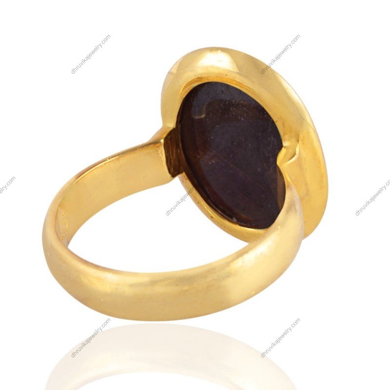 Elegant gold-plated ruby statement ring with handcrafted design and bezel-set gemstone view1