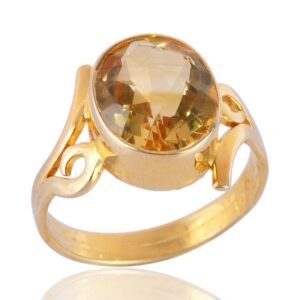 Gold-plated citrine ring with a faceted oval gemstone in a vintage swirl design main view