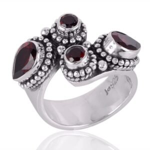 Sterling silver vintage garnet ring with oxidized finish and intricate detailing main view