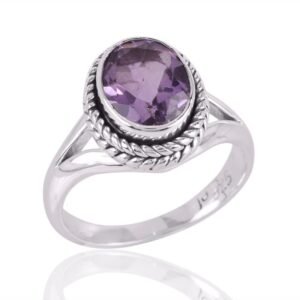 Sterling silver amethyst ring with vintage-inspired design, featuring faceted purple gemstone. main view