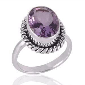 Elegant sterling silver ring with an oval-cut amethyst gemstone and vintage rope design main view